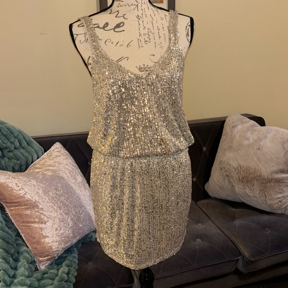 New. Sequins top and skirt. Women’s L.